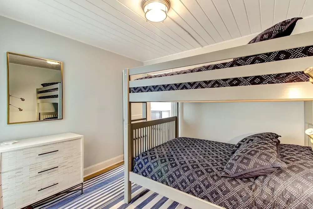 Roomy Chalet-Style Beachfront Condo with Private Beach Access by RedAwning