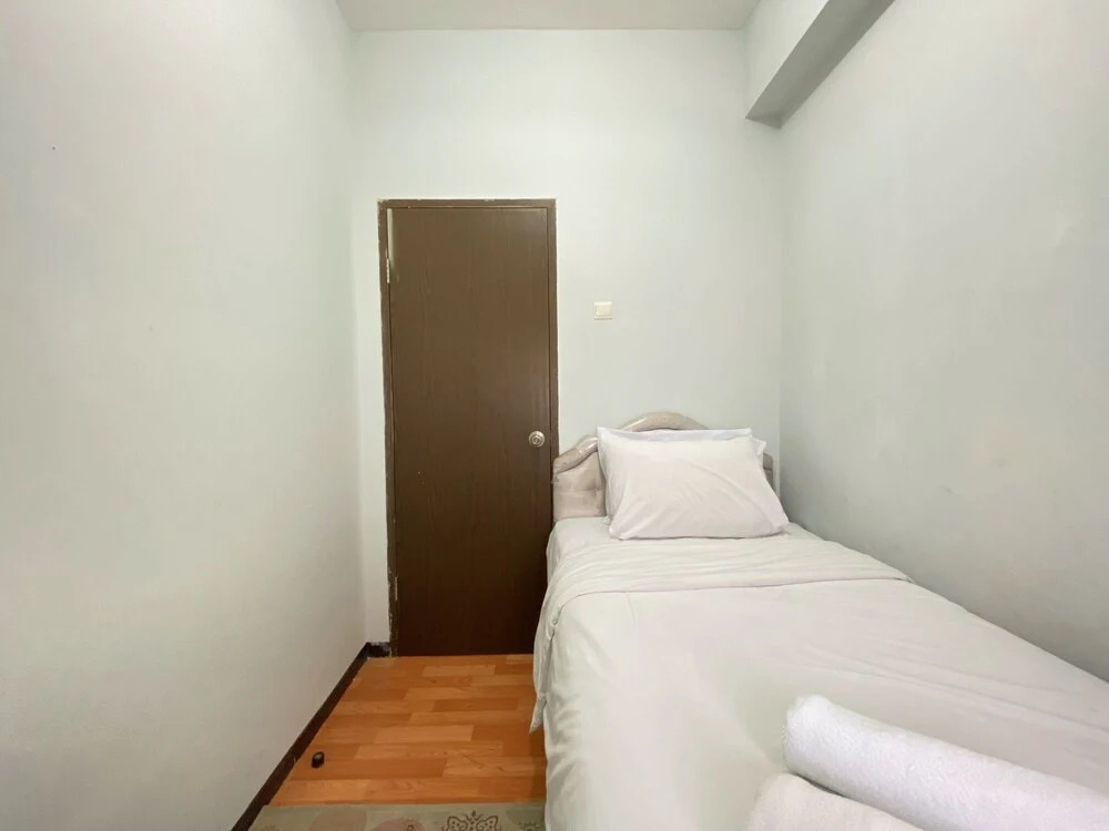 Modern Designed 2BR at Suites @Metro Apartment By Travelio