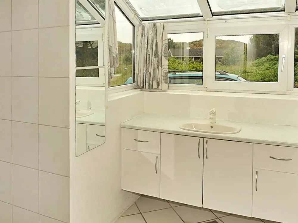 Trendy Holiday Home in Henne With Sauna