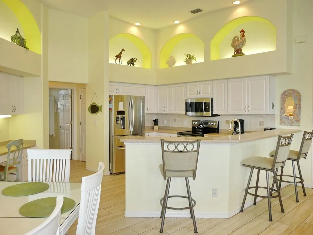 Waterfront home with views, pool and walk to beach