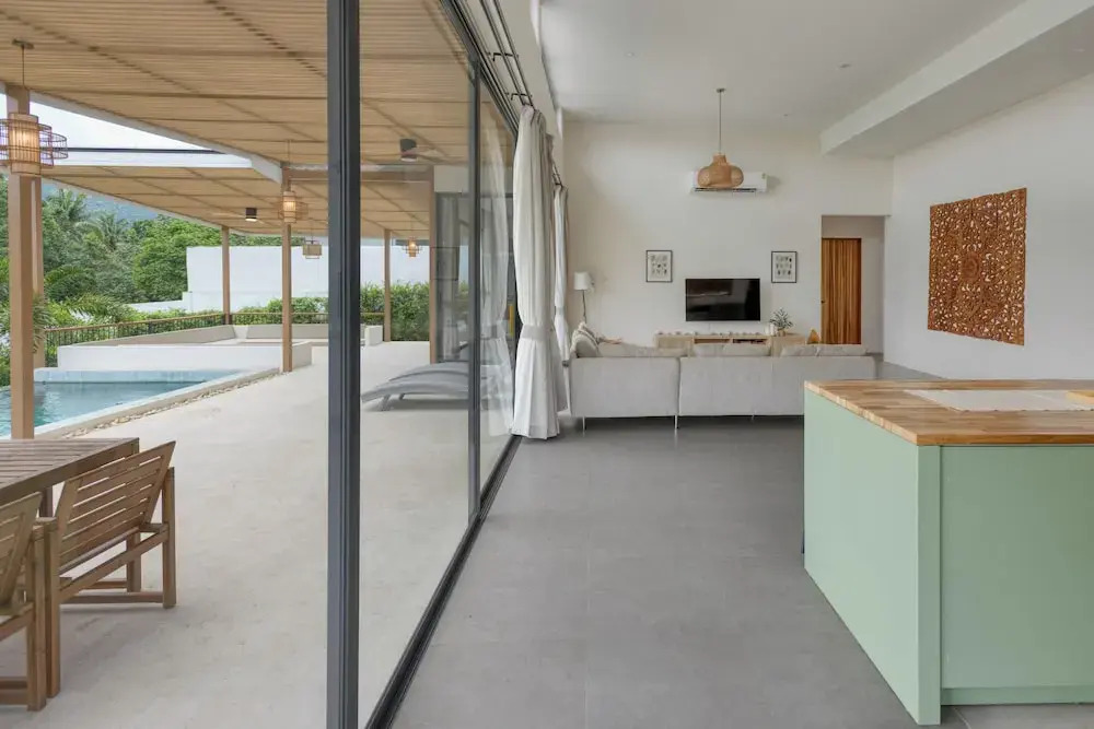 Tropical Poolside Retreat by Sea N' Rent