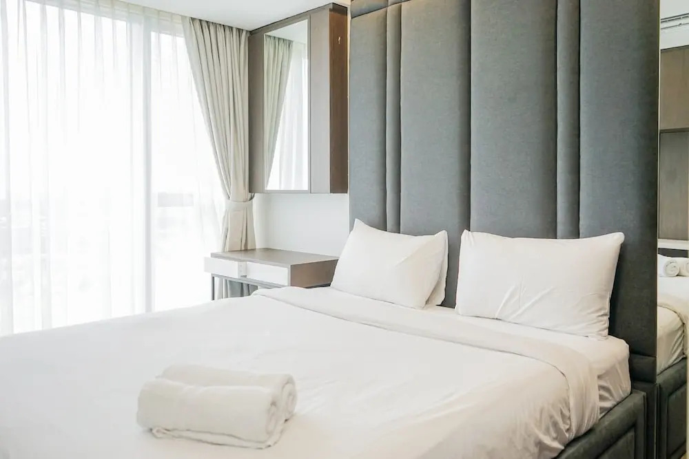 Scenic and Comfortable 2BR Branz BSD City Apartment By Travelio