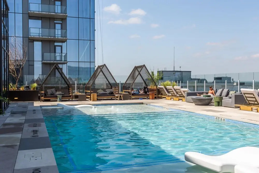 20th floor condo with pool on Rainey St by Locale