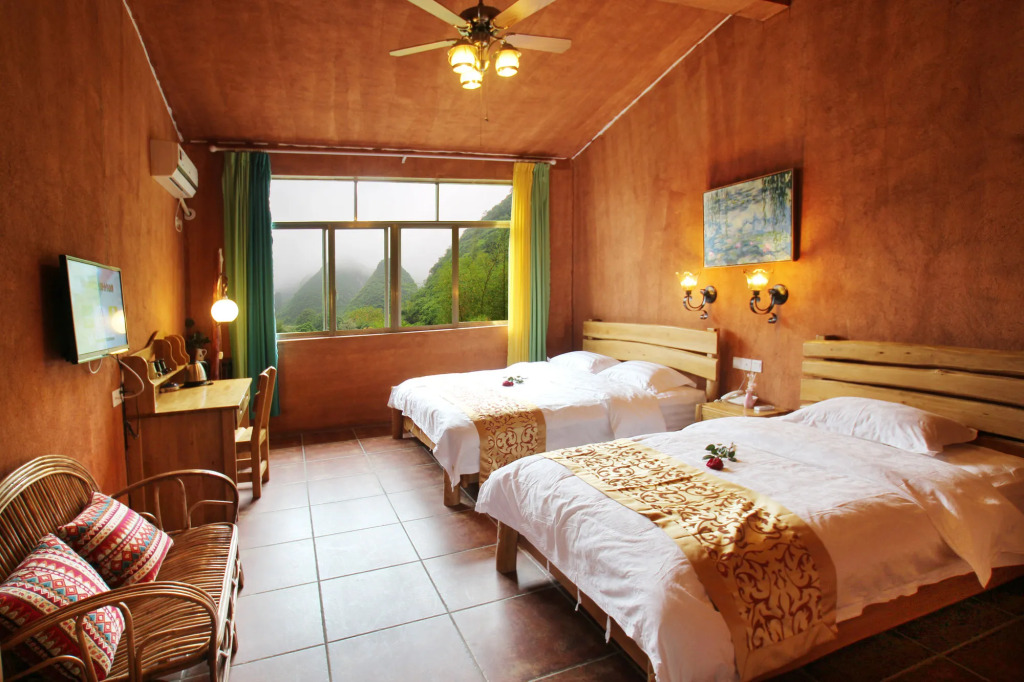 Yangshuo Edens Social Guesthouse - cozy garden courtyard & fresh craft coffee & night beers & outdoor activities