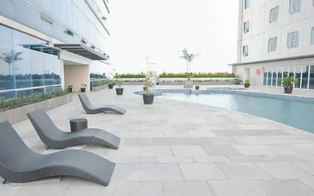 Combined Grey Toned 2Br Apartment At The City Square Surabaya