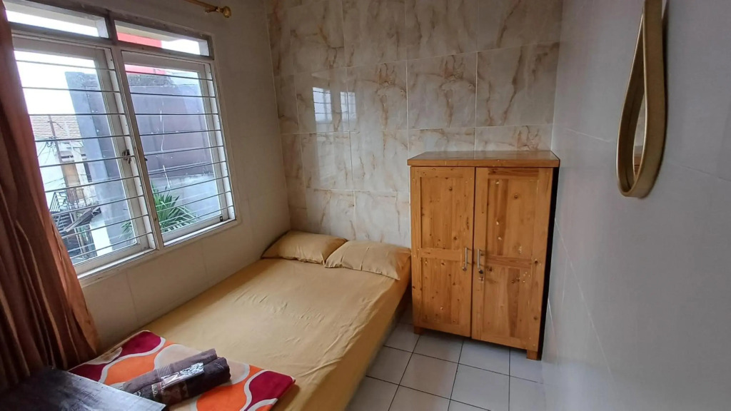 Spot On 3988 Kost Carmelia Baranangsiang Syariah