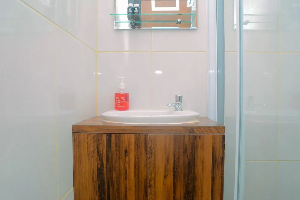 Cozy Living 1BR at Grand Kamala Lagoon Apartment By Travelio