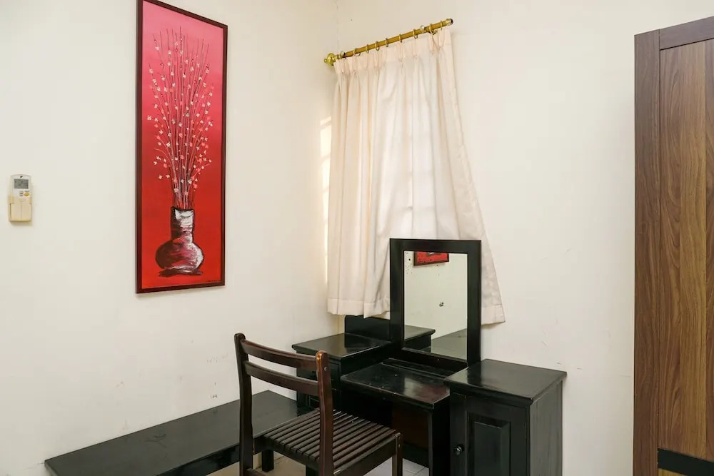 Clean and Homey 1BR at Puri Garden Apartment