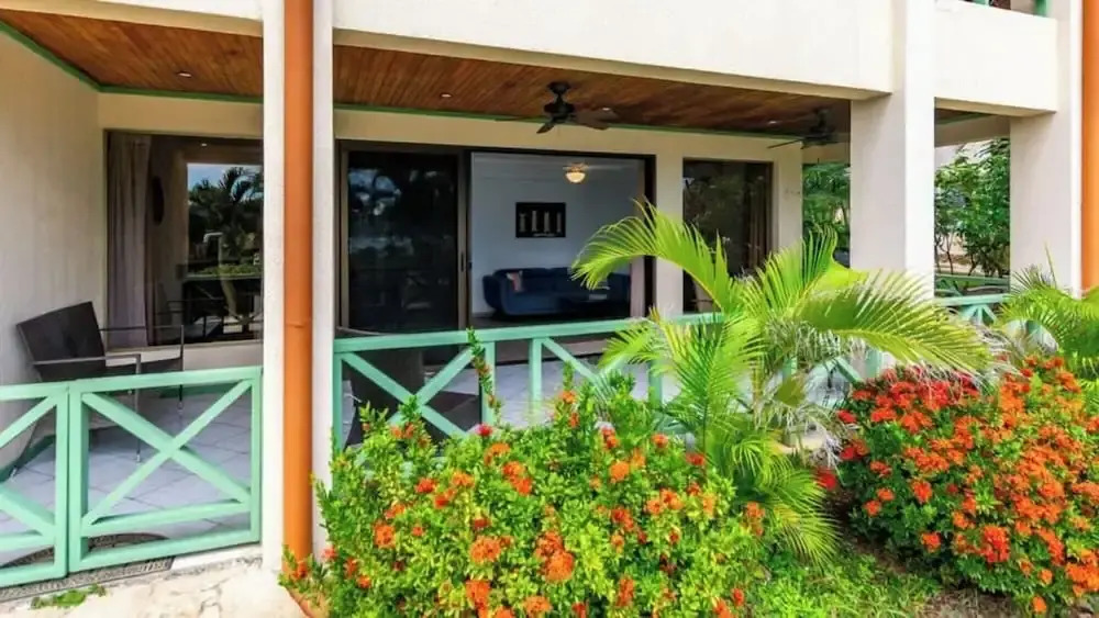 Elegant Condo with Brand-New Fixtures, Shaded Tropical Terrace, and Secluded Beach Access