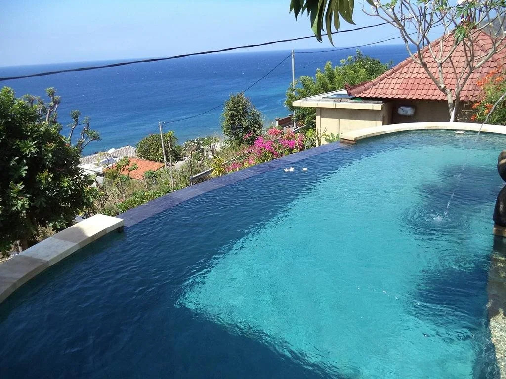 Paradise Palm Beach Bungalows and Dive Center