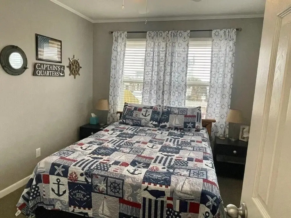 Sandy Bottoms 4 Bedroom Home by RedAwning