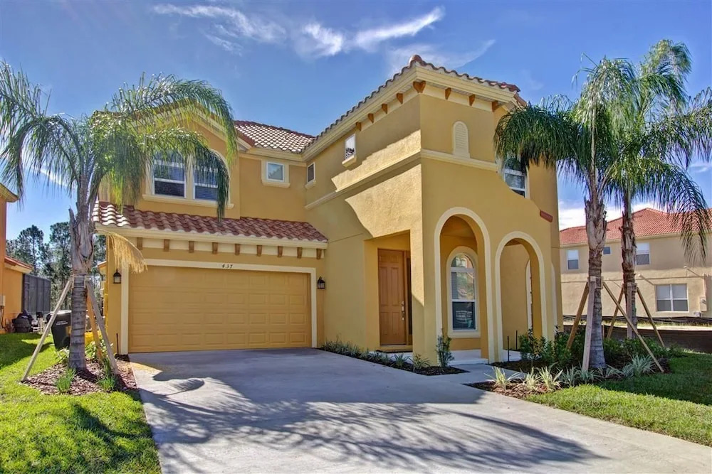 Spacious 6-Bedroom Getaway with Game Room, Private Spa & Sunny Pool Deck in Premier Resort Setting