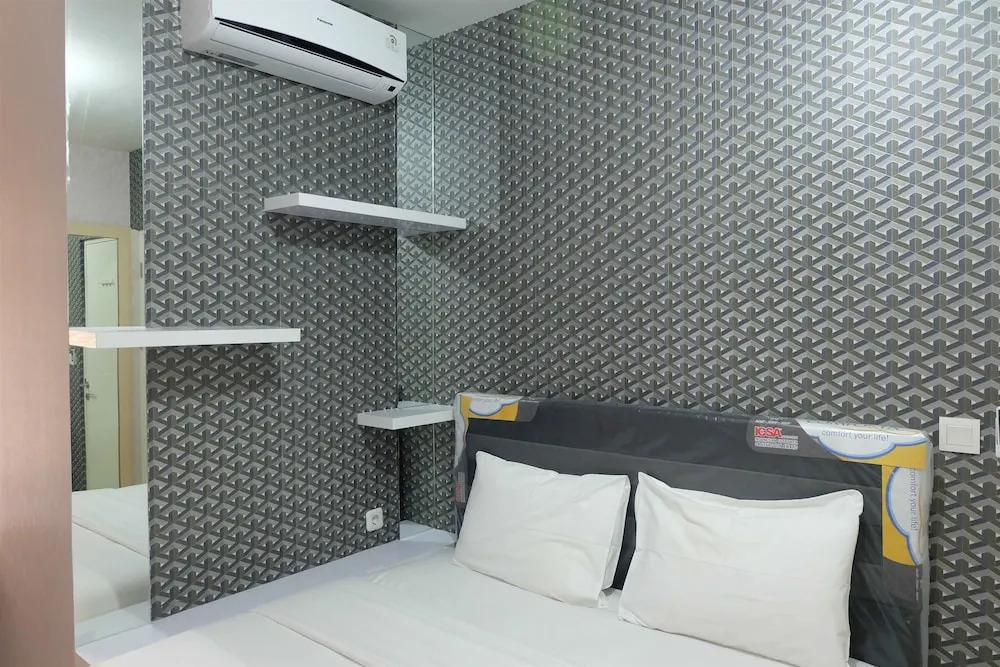 Homey 2BR with Pool View Apartment @ Springlake Summarecon By Travelio