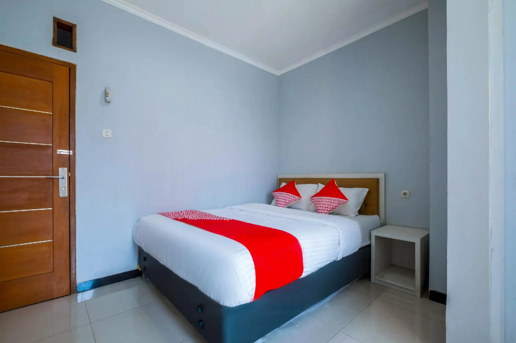 Karins Guesthouse Syariah RedPartner