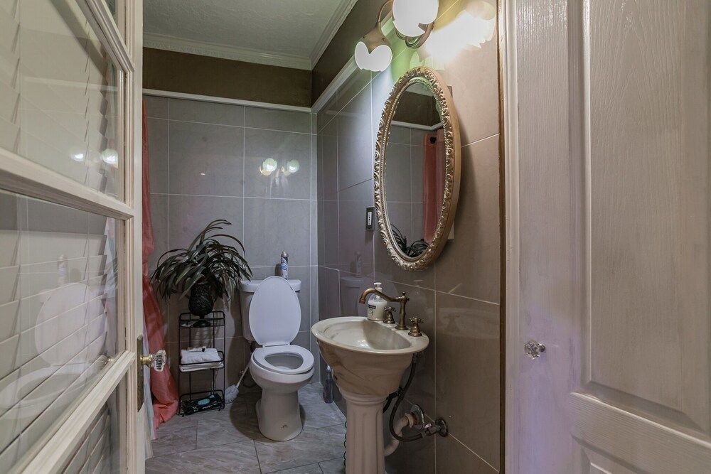 The Old Downtown Historic Grand Prairie House 4 Bedroom Home by RedAwning