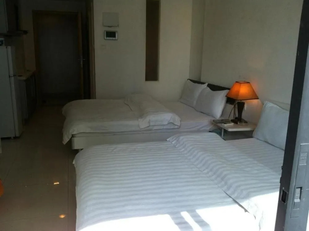 Huamei Apartment Hotel