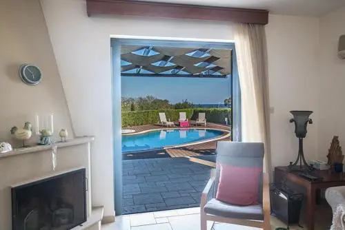 Picture Relaxing Beside Your Private Pool in Protaras Reading Your Favourite Book, Protaras Villa 1320