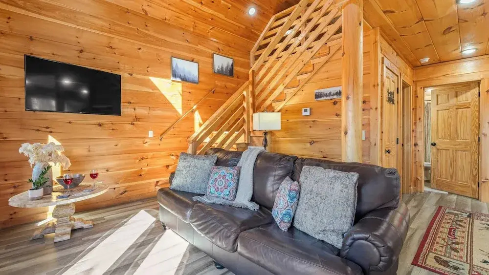 Hot Tub, Game Loft, Open Living, Minutes to Downtown Gatlinburg Whisper Cabin by Avantstay