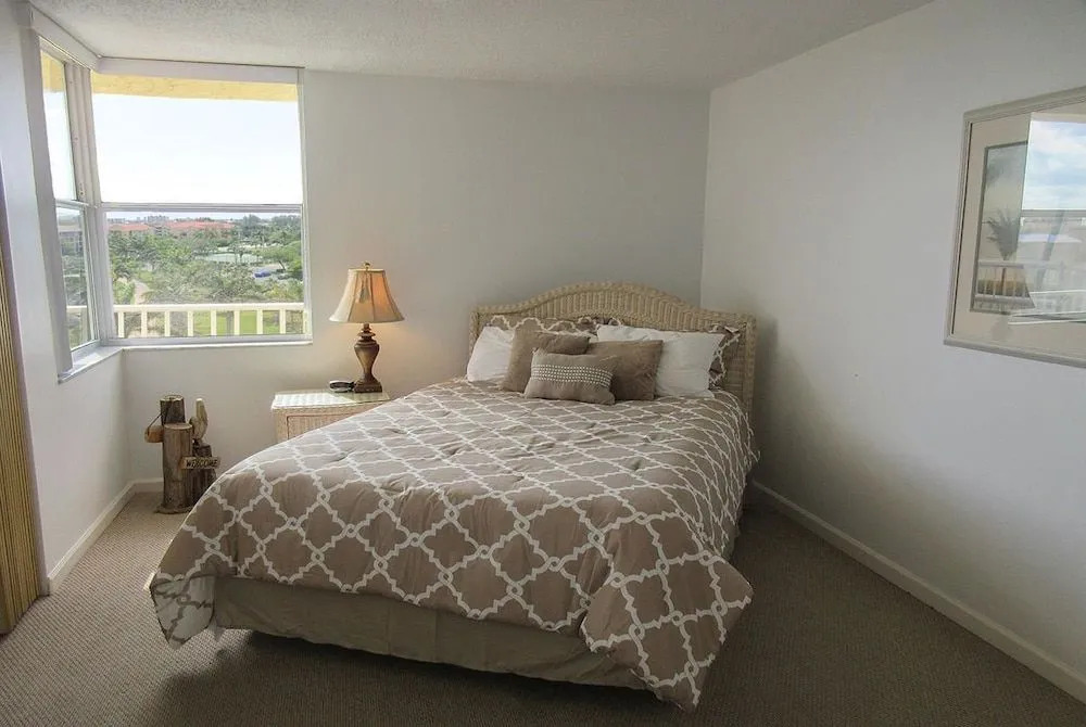 Estero Beach & Tennis 608B by RedAwning