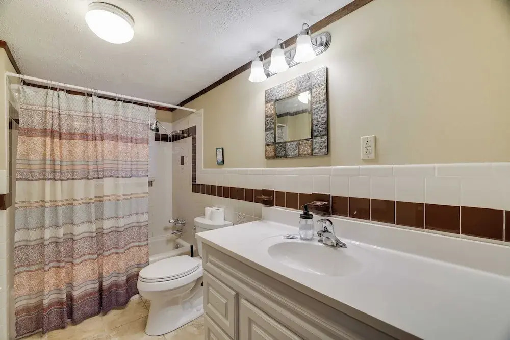 Hot Tub + Sauna + Deck + Firepit + Beach Access + Near Dining Grateful Escape by Avantstay