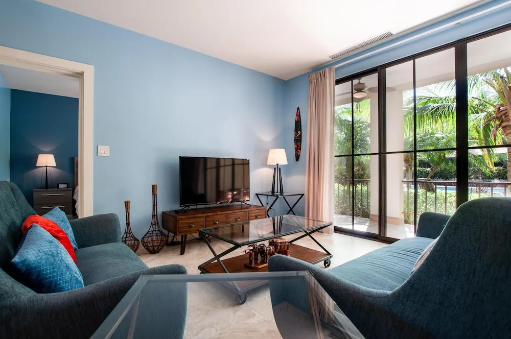 Nicely decorated ground-floor unit in front of pool at Pacifico in Coco