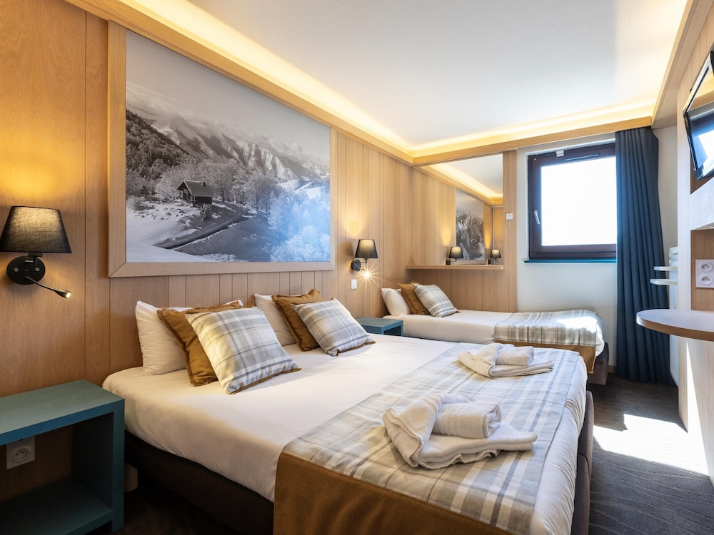 Living for Three in the Heart of Huez
