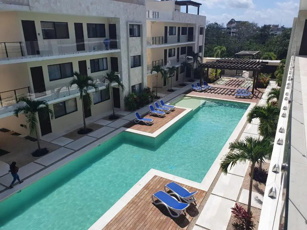 Blue Luxury 1 BD Apartment - Direct exit to the Pool - Fast WiFi - Free Parking