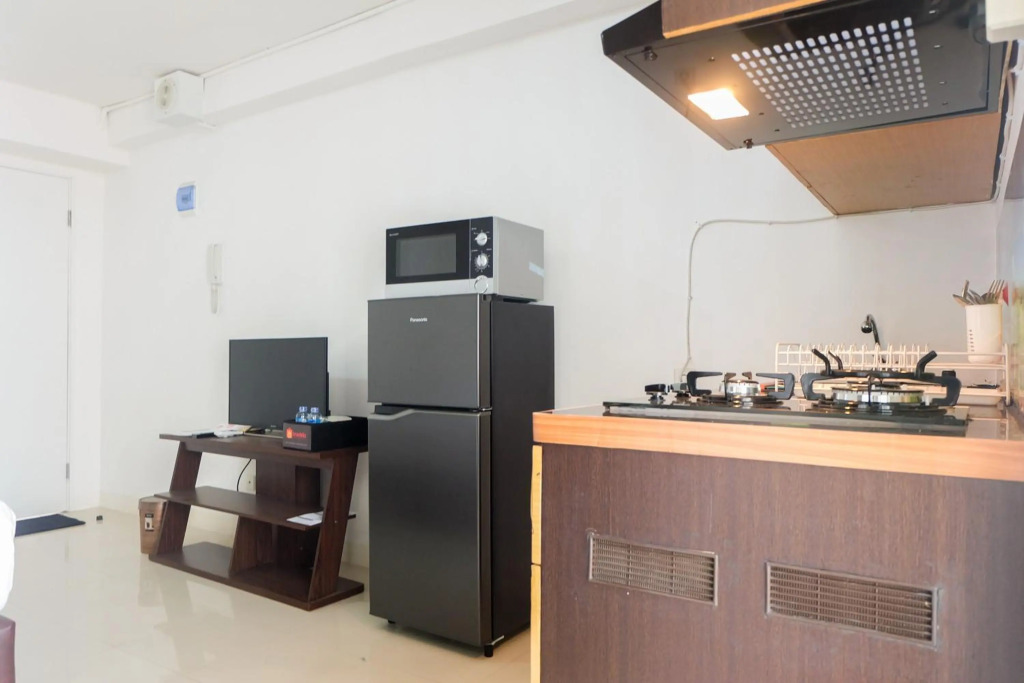 Comfort and Spacious Studio Room Bassura City Apartment By Travelio
