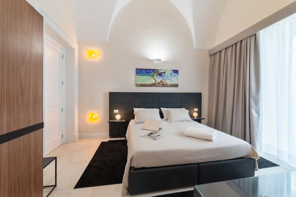 Y Arcillos Luxury Rooms CIN ITO75O35B4OOO468O2