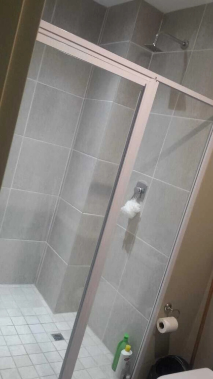 Lovely Rosebank 1-bedroom condo with pool & cinema