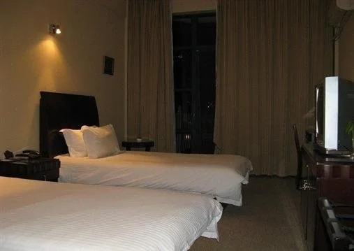 Baolong Homelike Hotel (Luojing Branch)