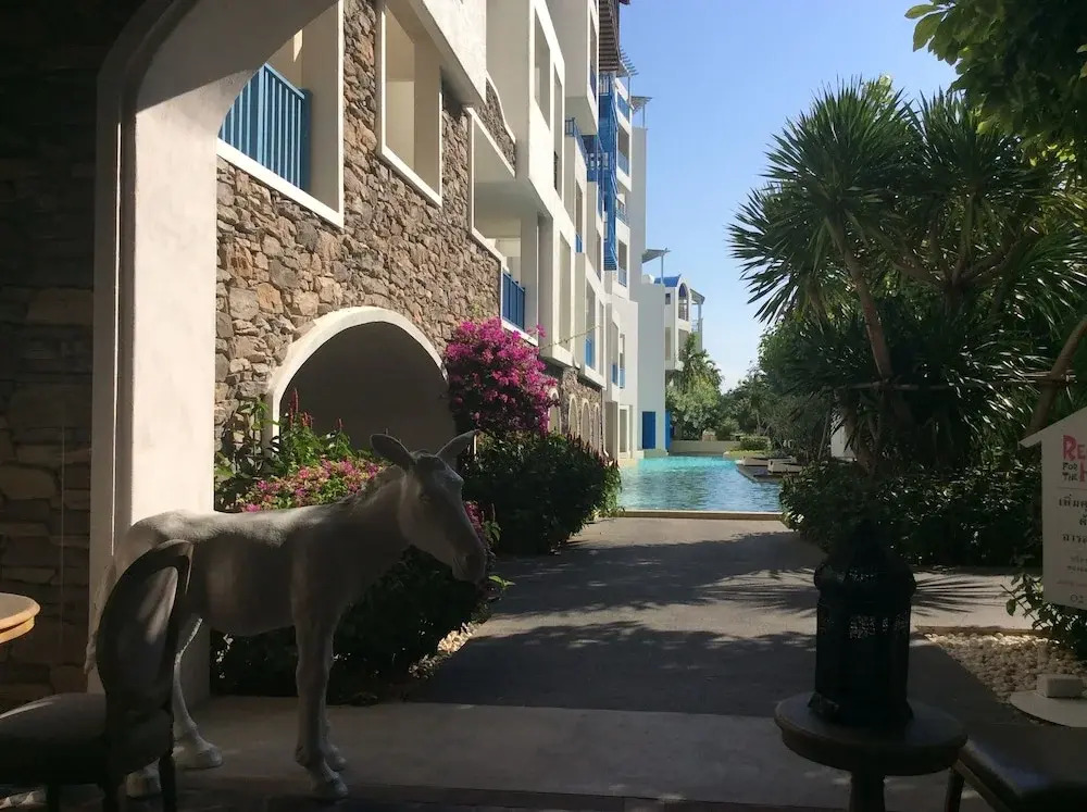 The Che Pool Access Beachfront Condo by Away