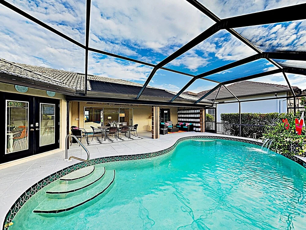 New Listing! Chic Beach Haven W/ Pool, Near Beach 4 Bedroom Home