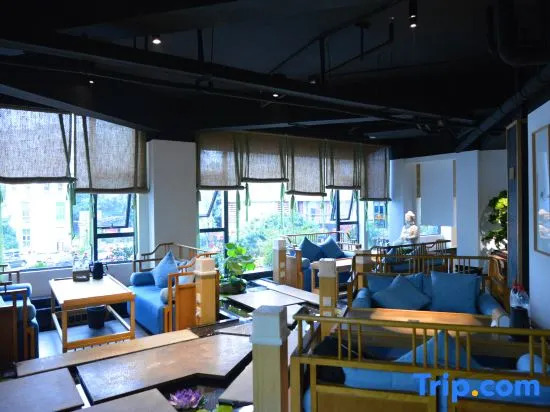 Youjia Traders Hotel (Pengzhou Longxing Temple)