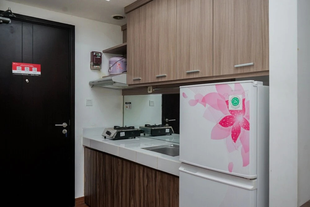 Comfort And High Floor Studio Room At Casa De Parco Apartment