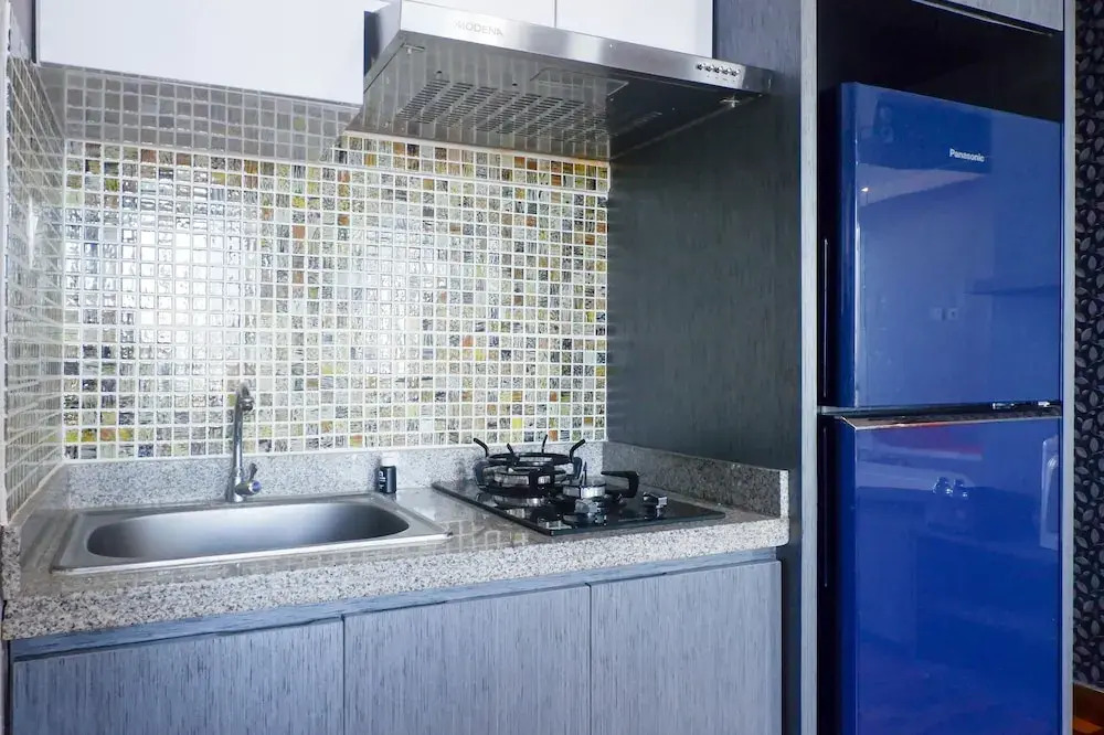 Spacious & Exquisite 1BR Apartment at Tamansari Papilio By Travelio