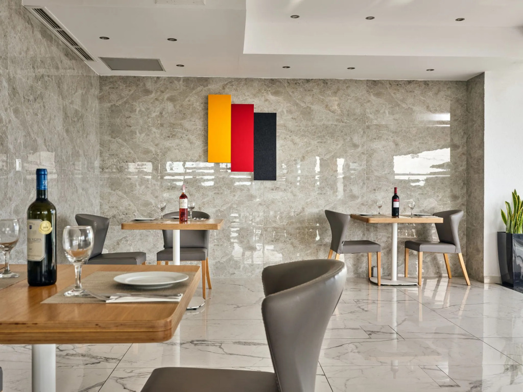 Cavo Orient Beach Hotel & Suites