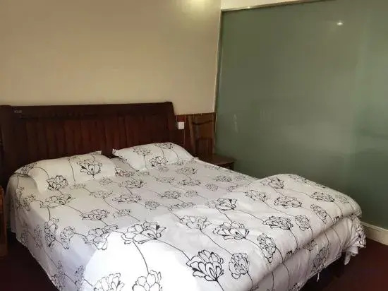 Jing Taohua Jie Holiday Homestay (Taohua Tan Scenic Area)