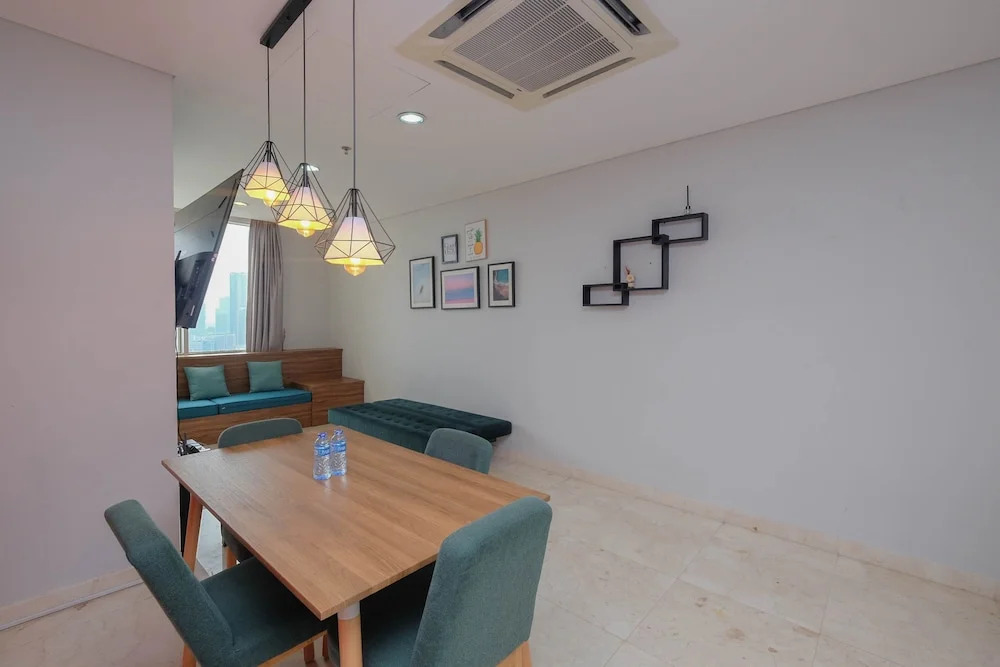 Luxury and Strategic 1BR Apartment at The Empyreal Epicentrum By Travelio