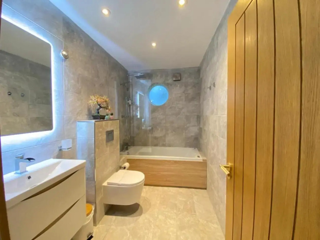 Lake District cottage in one acre gardens off M6