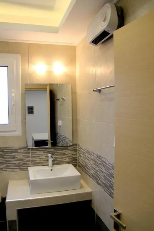 Thiseos 319. Beautiful apartments near the cultural center of the capital.