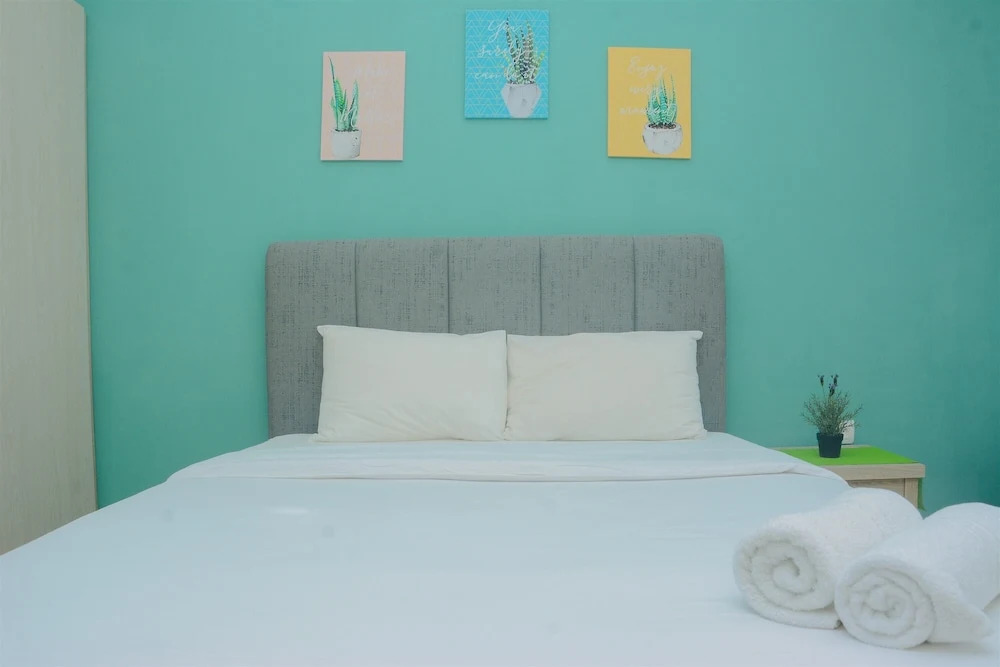 Fully Furnished and Comfortable Design Studio Menteng Park Apartment By Travelio