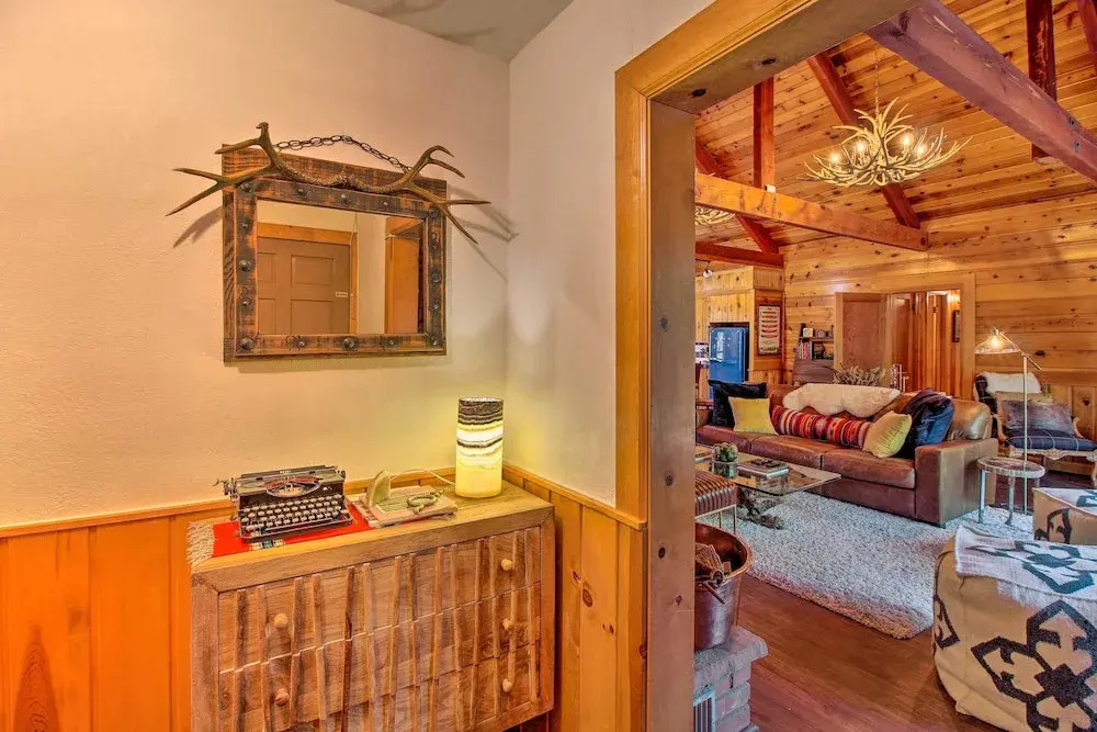 1 Mi to Rainbow Lake: Lakeside Cabin w/ Deck!
