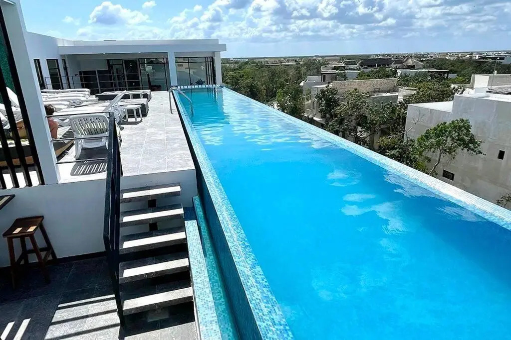 Fresh and Stylish Studio Aldea Zama rooftop pool Mya 109