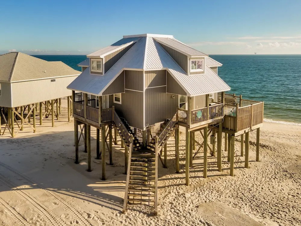 Strand Castle - Gulf Front! An Ideal Layout With Game Room, Small Private Pool, And Roof Top Crow's Nest! 4 Bedroom Home by RedAwning