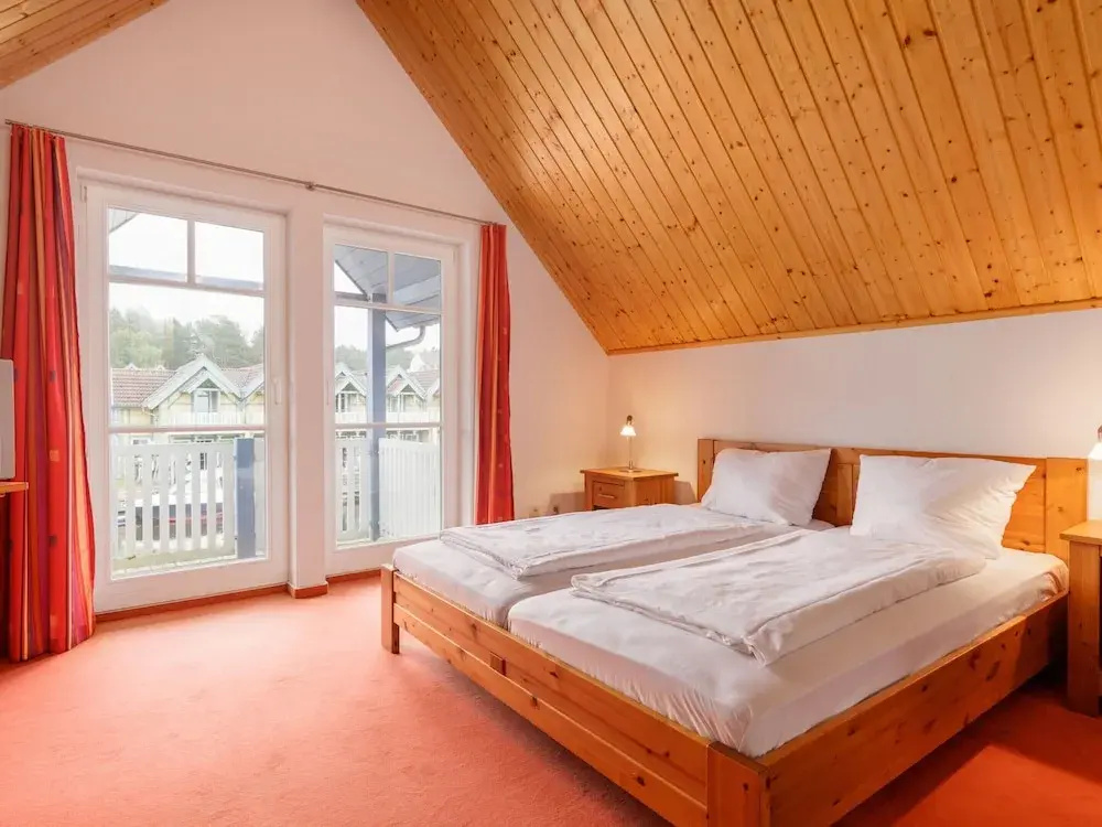 Cozy Holiday Home with Wood Burning Stove near Water