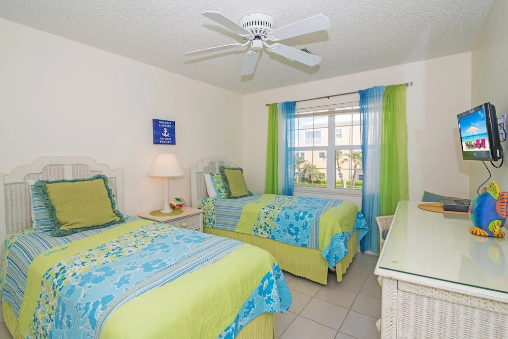 Regal Beach Club #122 by Cayman Vacation