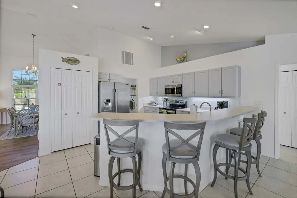 Contemporary Coastal Escape With Heated Pool, Fenced Yard, & Outdoor Dining