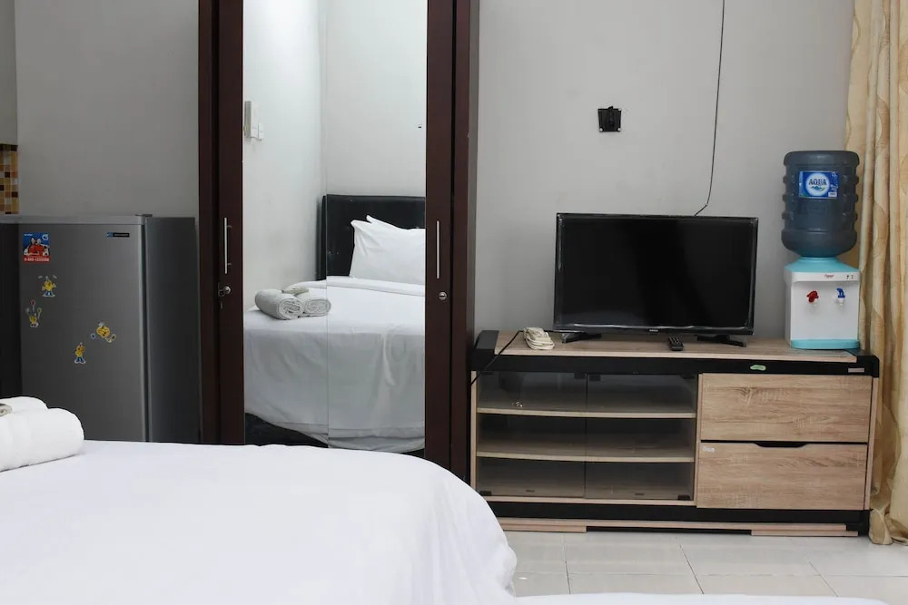Homey And Tidy Studio Taman Melati Margonda Apartment Near Campus