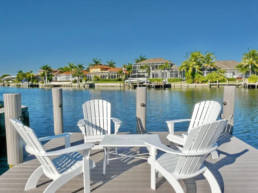 Waterfront home on key lot with pool, spa and views